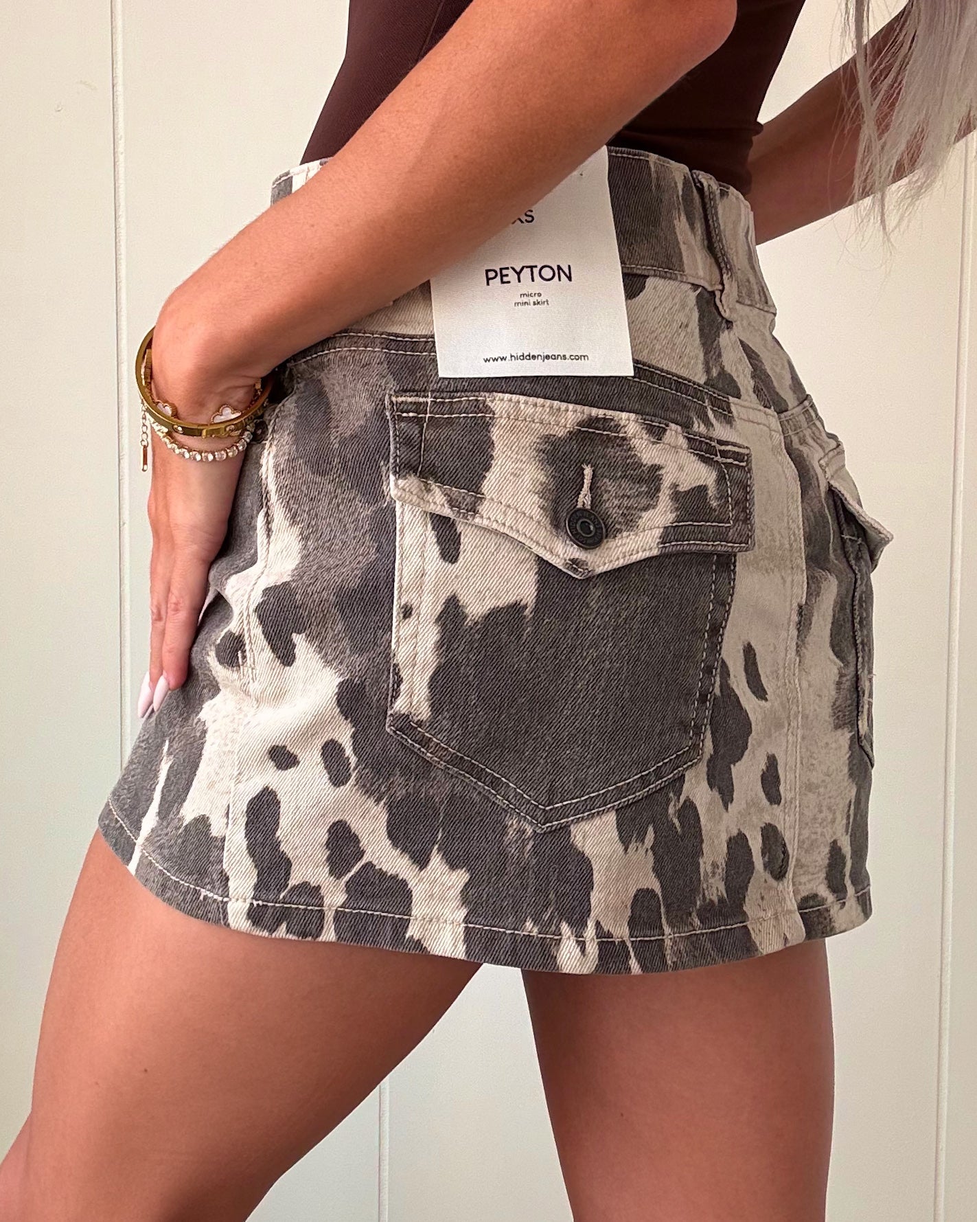 Roar Moment Mini Skirt - Cow Print
